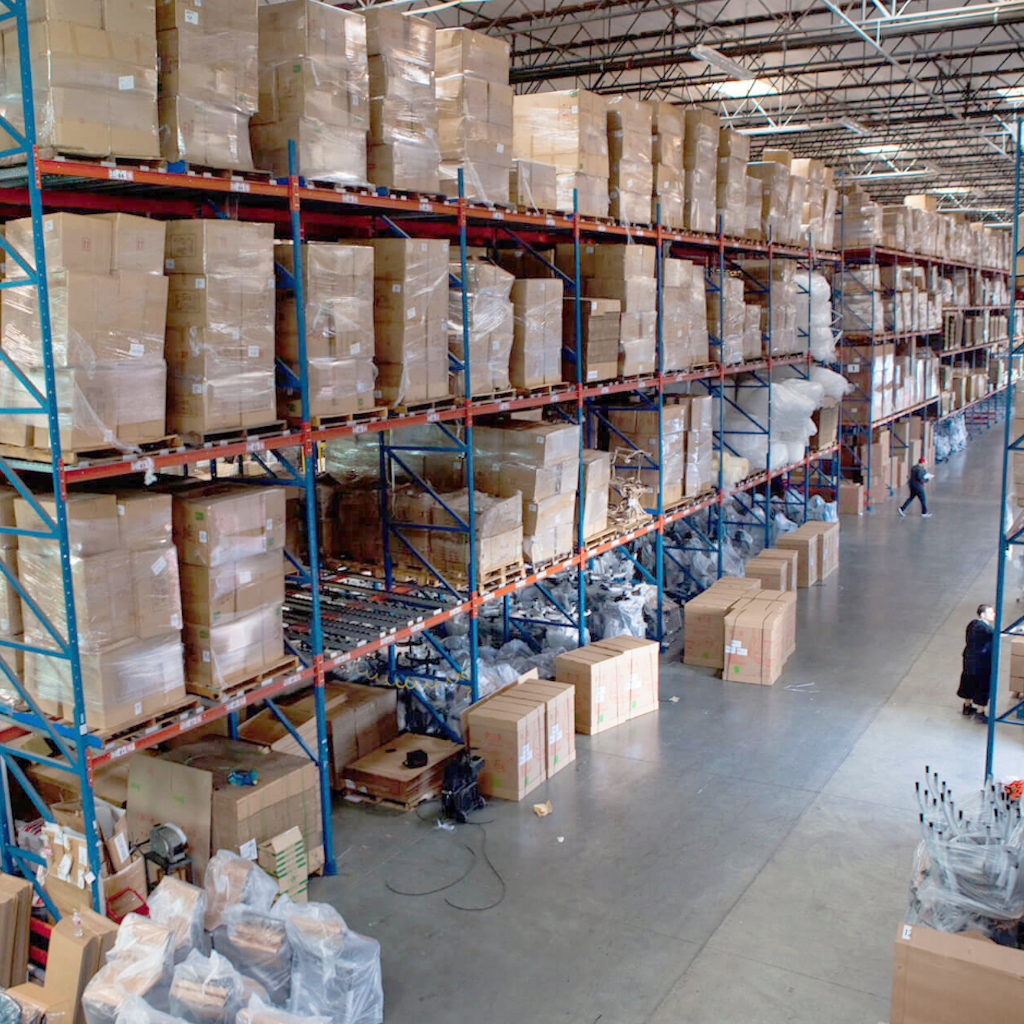 9to5 Seating warehouse full of executive chair and office chair boxes